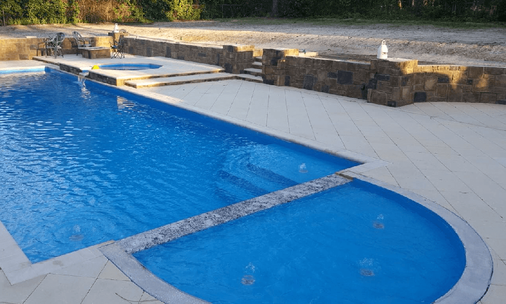 San Juan Pools Round Spill Over Tanning Ledge